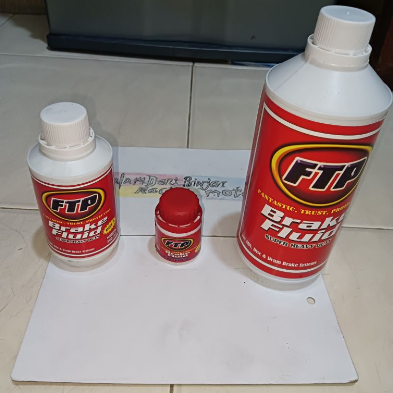 MINYAK REM FTP MINYAK REM BRAKE FUILD MOTOR / BRAKE FLUID MINYAK REM MOBIL DOT 3 /OLI REM MERAH /OLI