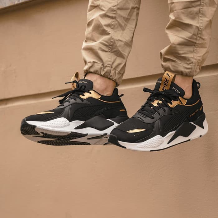 puma rsx trophy gold