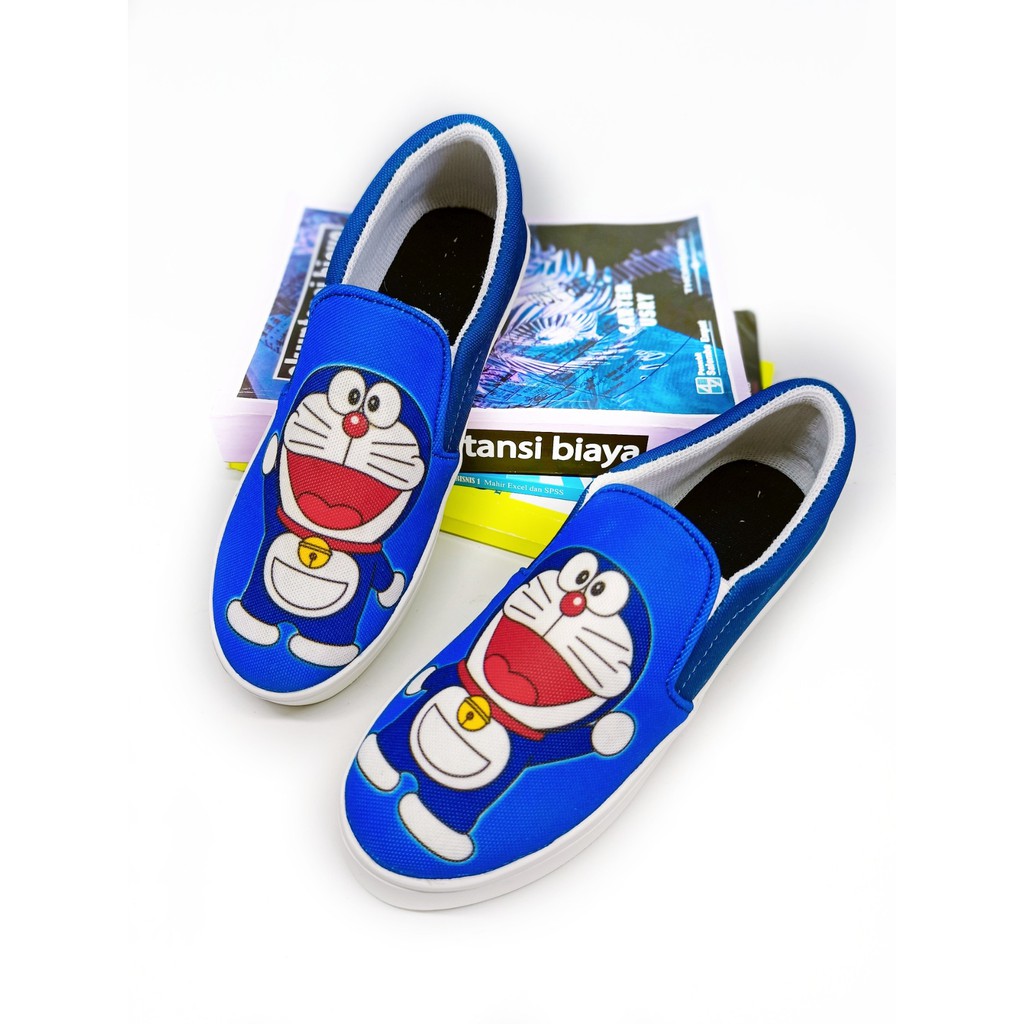 DINDA SEPATU WANITA SLIP ON DORAEMON REALPICT 100% MURAH - BIRU DAN HITAM