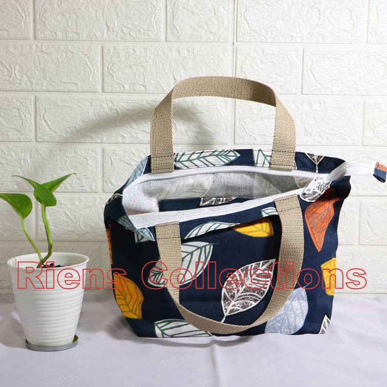 RIENS COLLECTIONS. HANDBAG BESAR BAHAN KANVAS MOTIF DAUN NANGKA BIRU