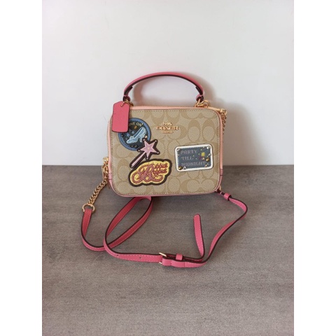 TAS WANITA CO DISNEY X COACH BOX CROSSBODY IN SIGNATURE CANVAS WITH PATCH