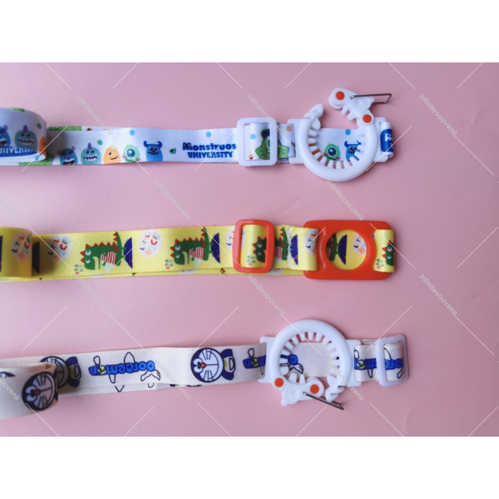 TALI GANTUNGAN BOTOL MINUMAN MOTIF DORAEMON, DINOSAURUS, DAN MONSTER INC