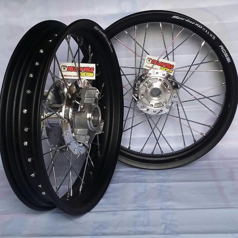 velg jari-jari Tiger Revo tapak lebar