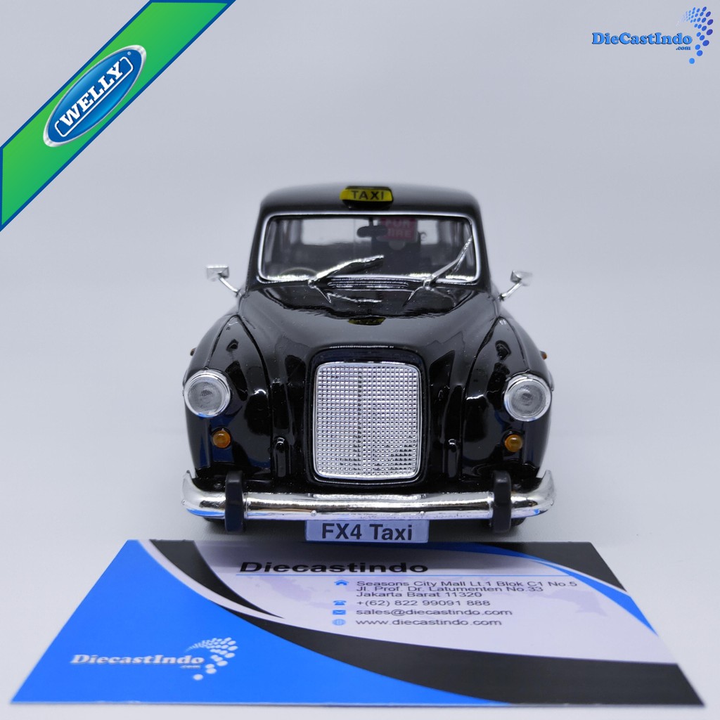 Welly Nex Austin FX4 London Taxi Hitam Skala 1:24