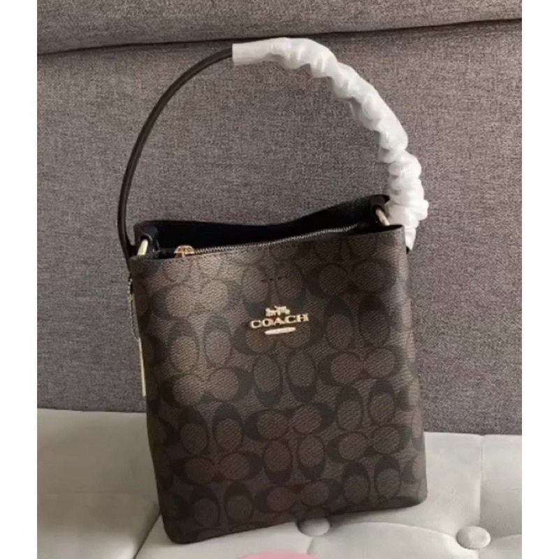 Coach bucket small mahogany signature