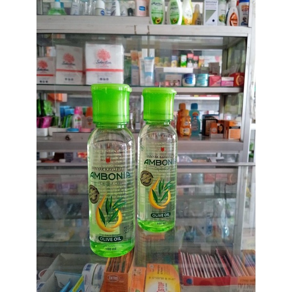 MINYAK KAYU PUTIH AMBONIA 100 ML CAP LANG