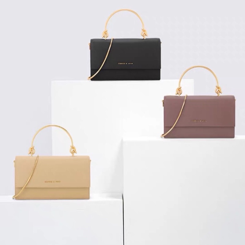 ck wallet chain clutch