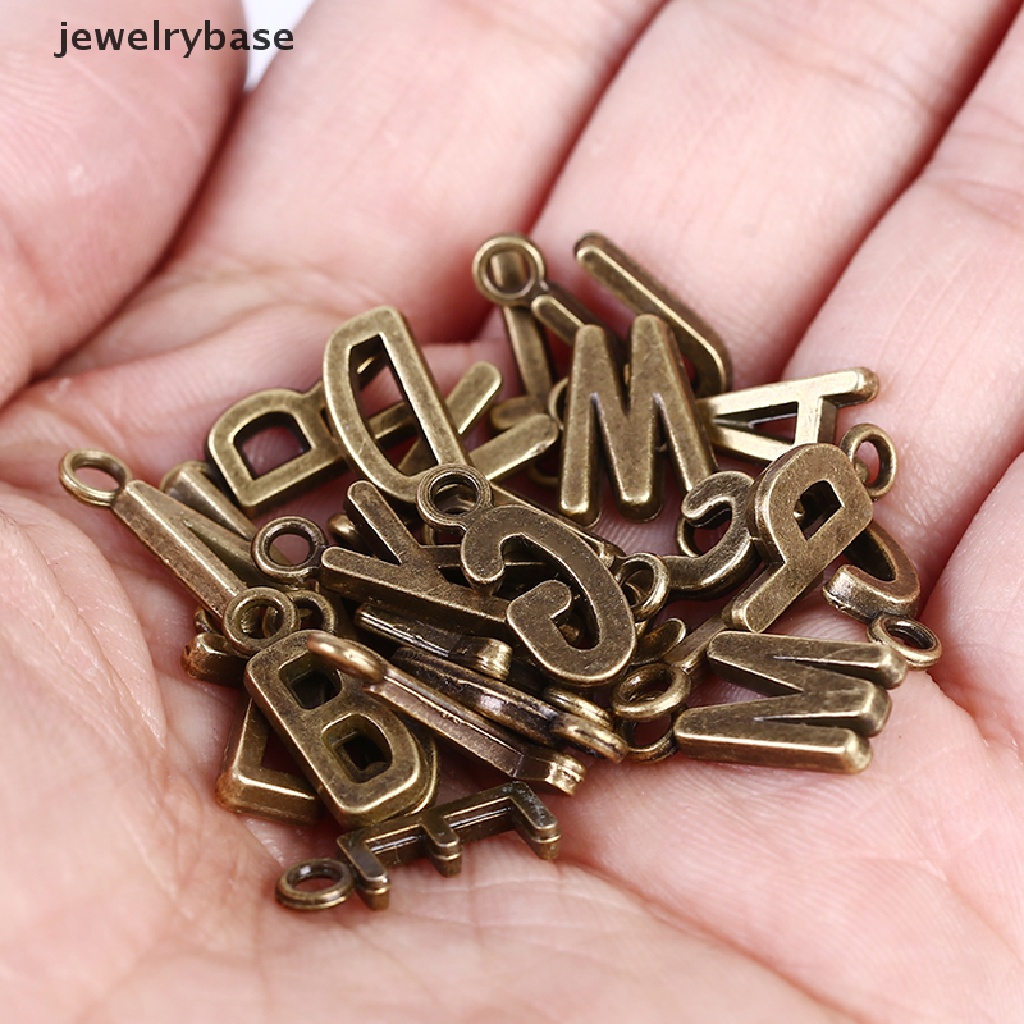 26 Pcs Liontin Huruf Alfabet A-Z Warna Silver / Gold Untuk Perhiasan Charms