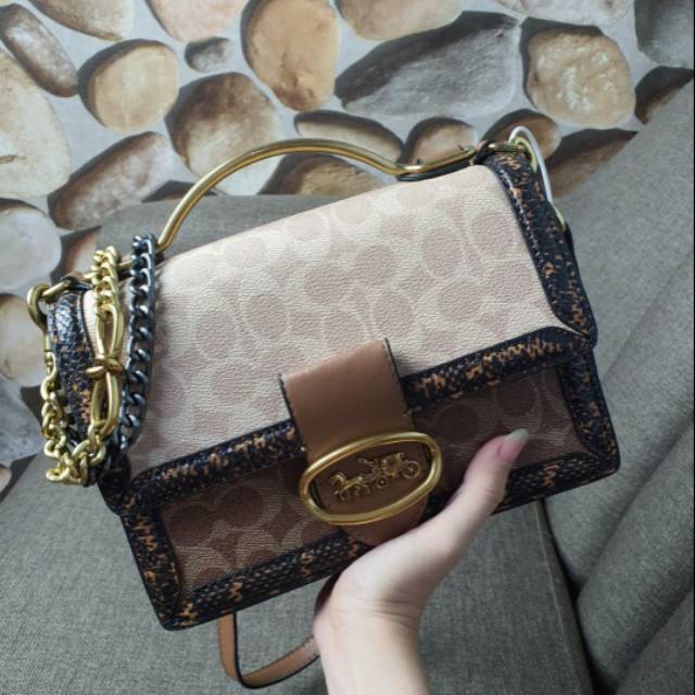 Coach hutton trunlock shoulder signature