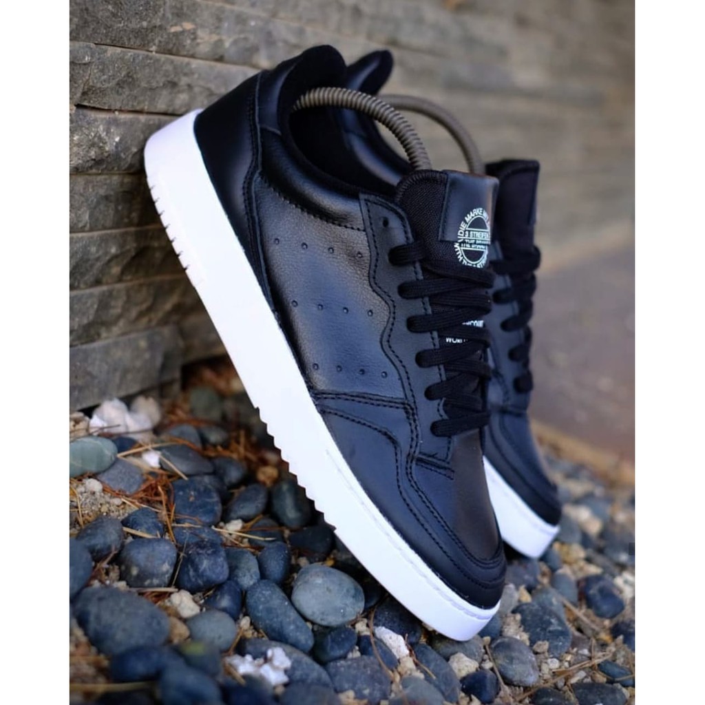 adidas black and white leather shoes