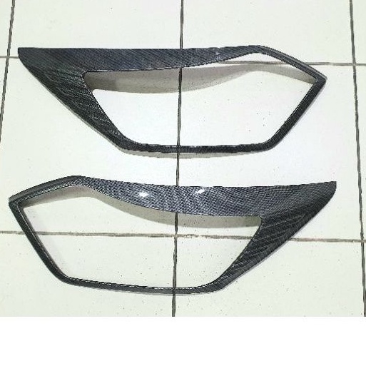 Garnish lampu carbon lampu depan Calya/Sigra New 2019 - 2022.