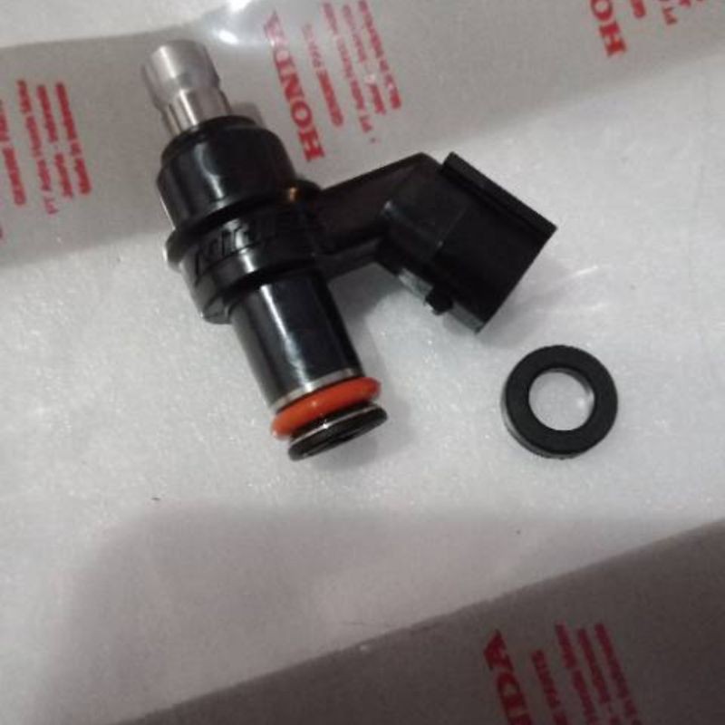 nosel injektor  nozzle injector supra x 125 fi lama kelauaran pertama 2009 revo at matic
