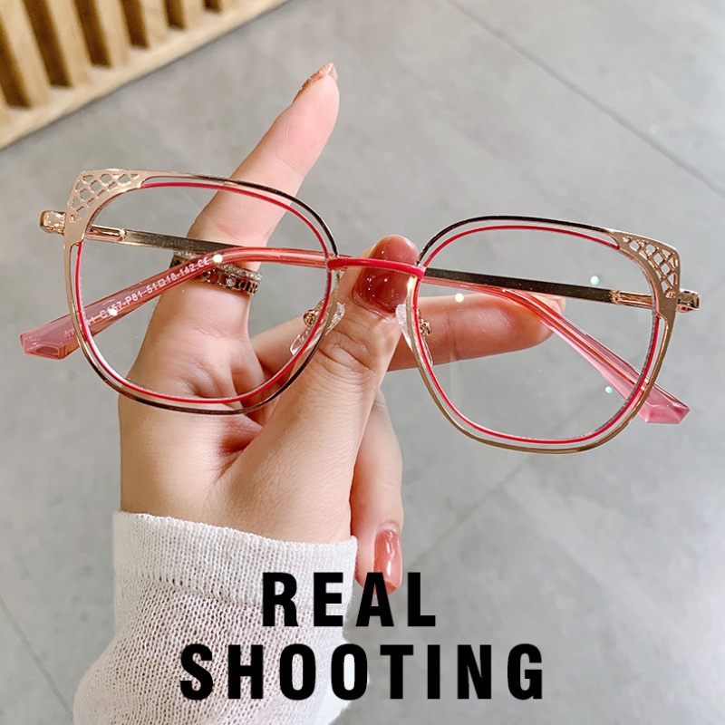 Kacamata Desain Mata Kucing Hollow Bahan Metal Untuk Wanita