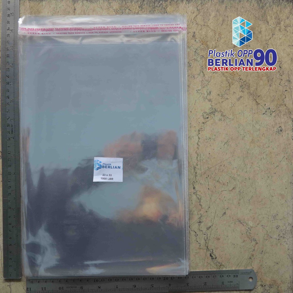 

23X33 CM PLASTIK OPP (SEAL/LEM) TEBAL 20 MIC ASLI / PLASTIK KEMASAN