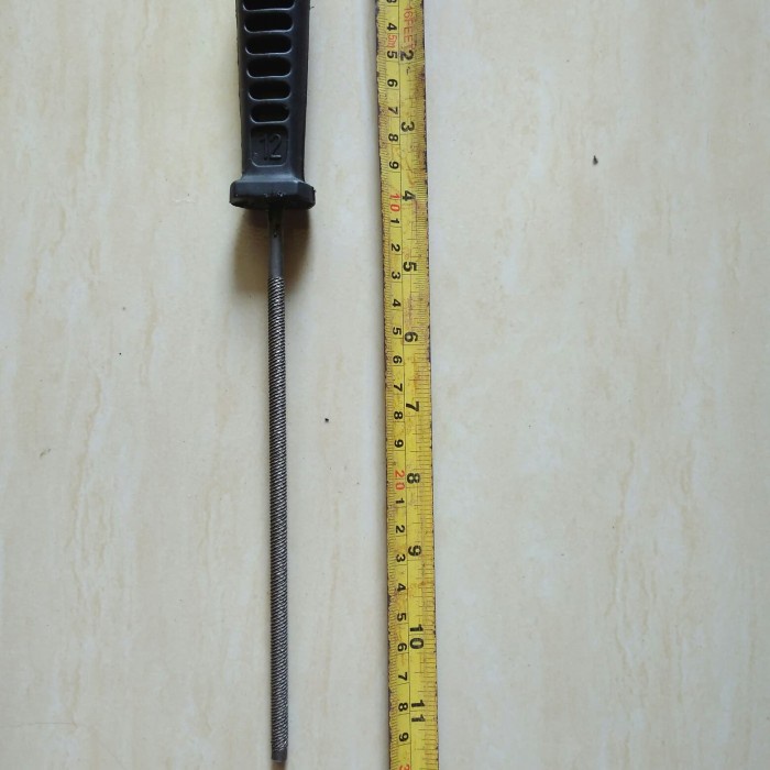 kikir besi bulat panjang