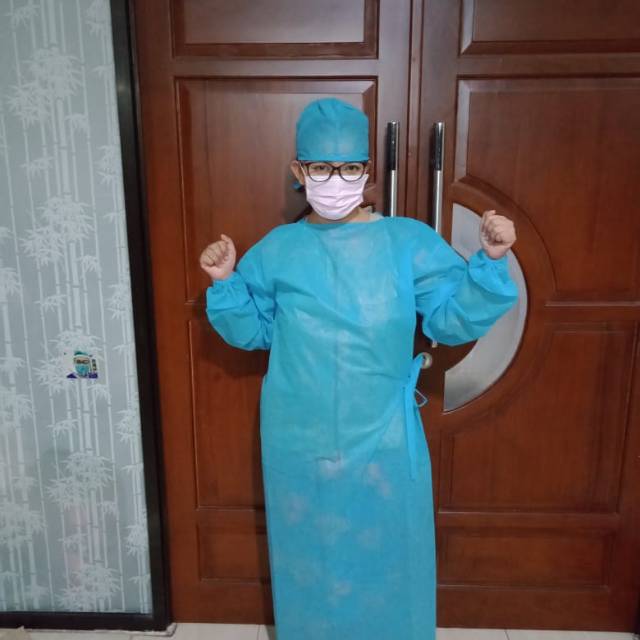 Hazmat gown + penutup kepala