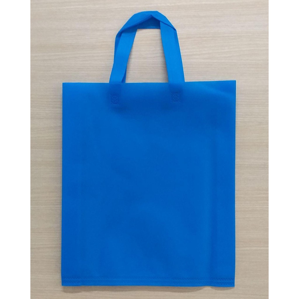 

GOODIE BAG SPUNBOND HANDLE 38x45 (Per Lusin) / Tas Belanja Murah / Tas Souvenir (Warna Biru)