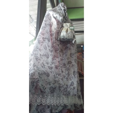 Mukena parasit motif bunga dan ubstrak mukena traveling cantik