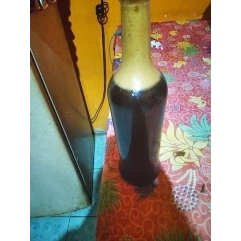 

madu hitam pahit asli