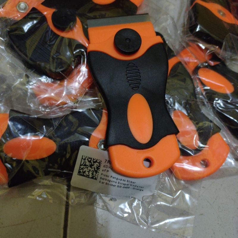 cutter pengikis pembersih lem kaca film stiker di kaca mobil