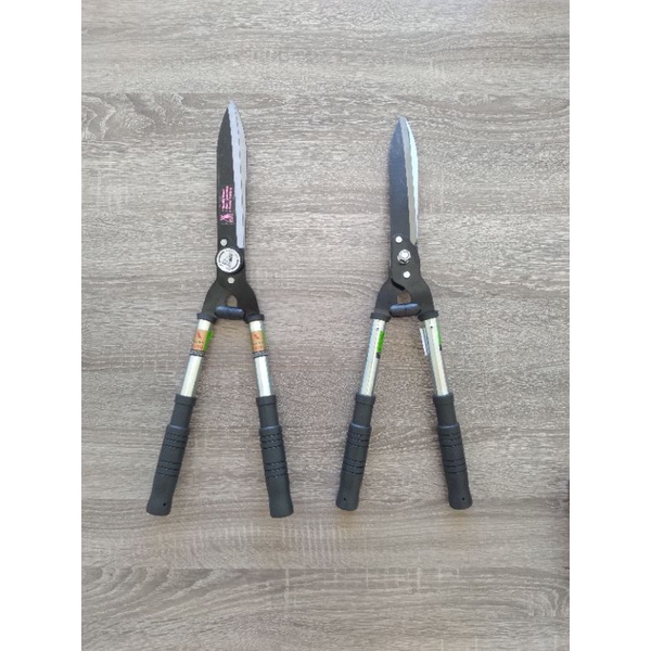 Gunting rumput taman daiyu