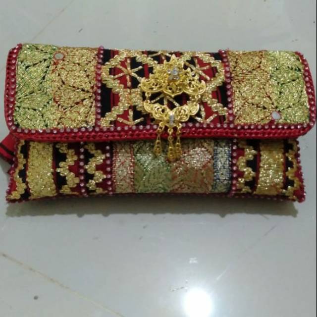 

Clucth tapis pecah beling