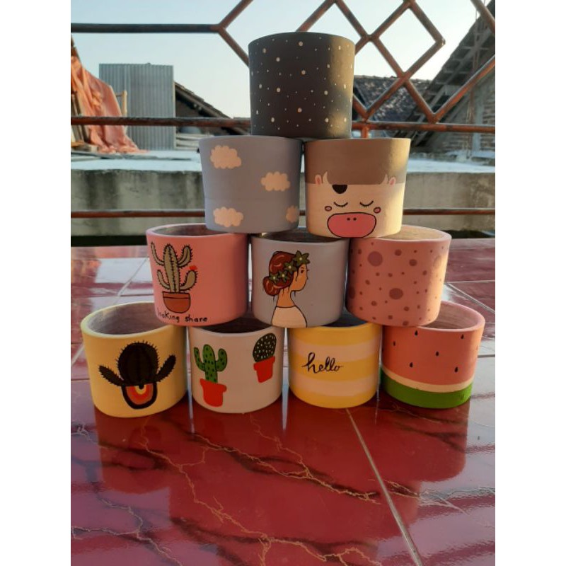 

Pot lukis