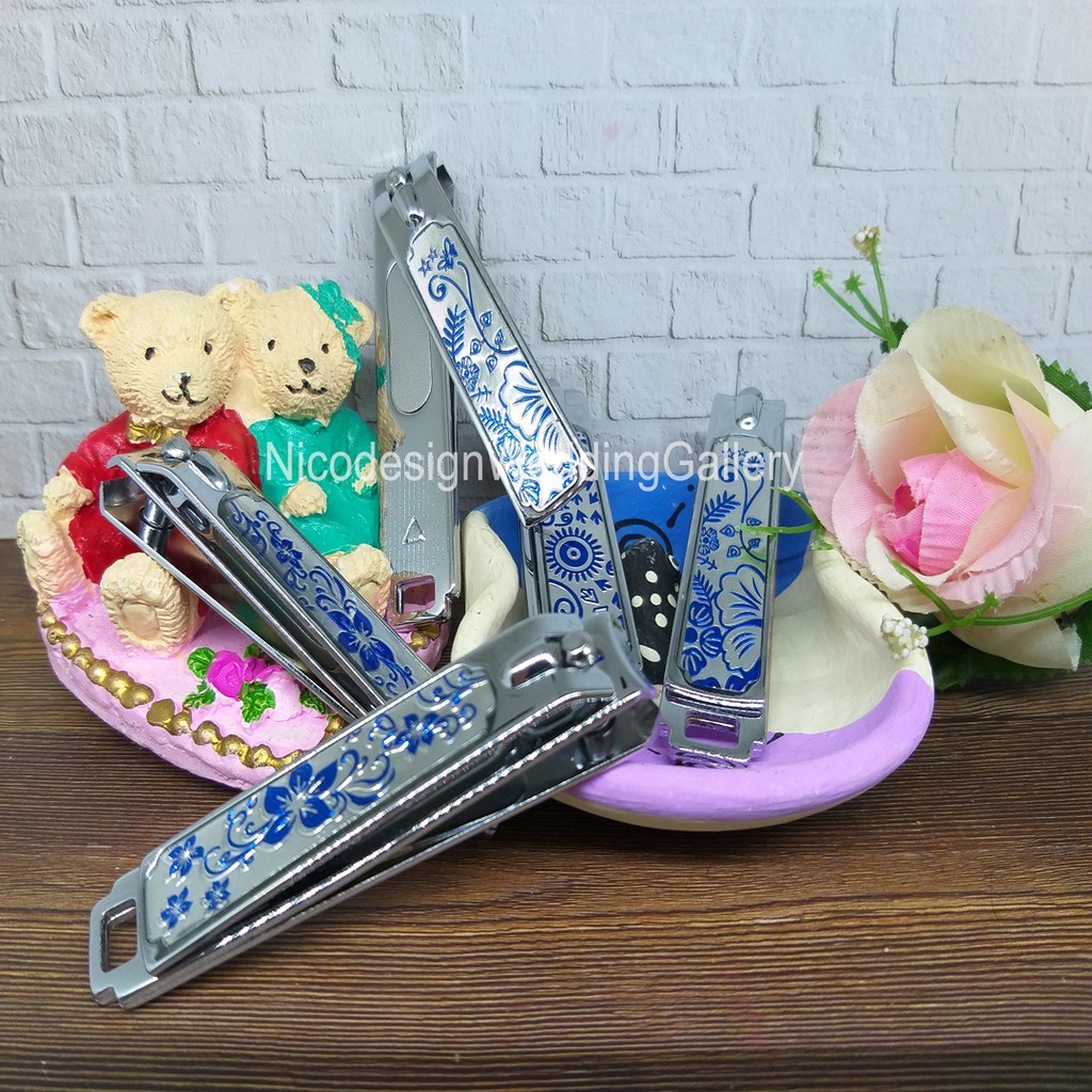 

Souvenir Pernikahan - Gunting Kuku Stainless - Bunga Biru