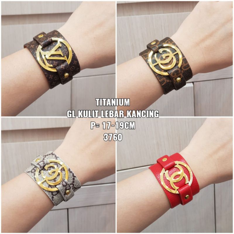 Gelang titanium kulit lebar kancing