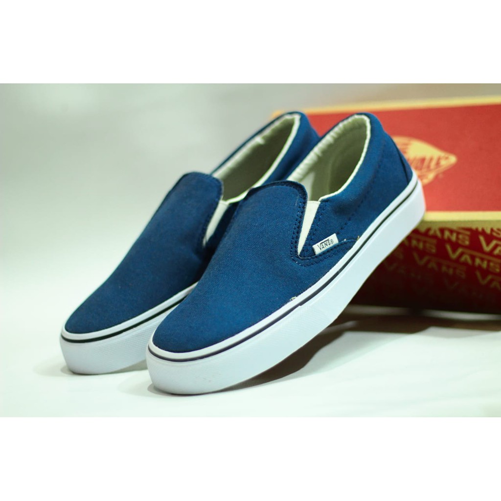 navy vans slip ons