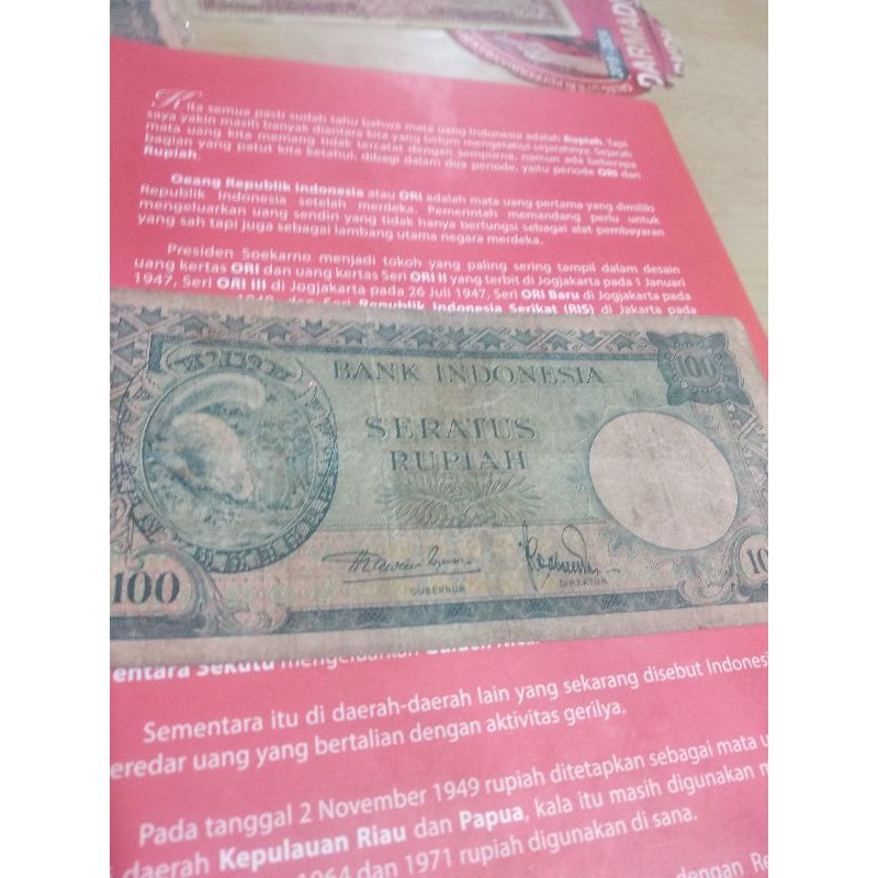 

uang kertas kuno 100 tupai