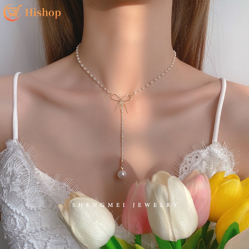 Kalung Choker Rantai Emas Dengan Liontin Pita Hias Mutiarakristal Elegan Untuk Wanita