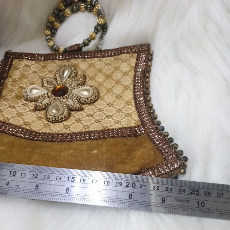 DOMPET ETNIK PRELOVED