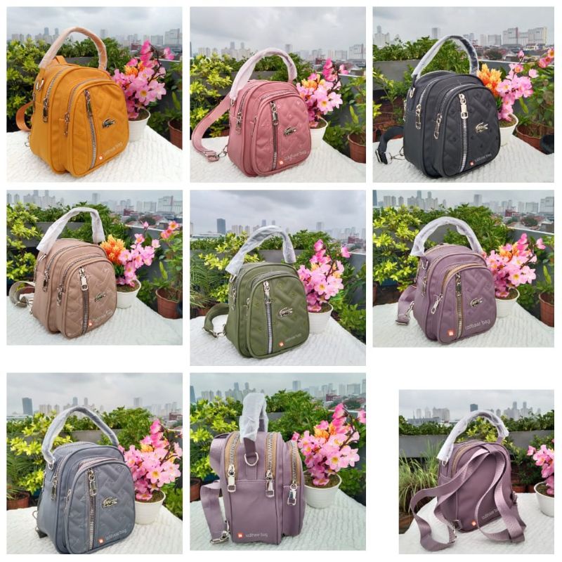 tas ransel 4 ruang bahan nilon bordir depan ukuran T21xL19 x9 cm.-3