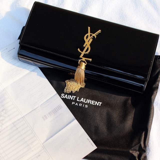 Tas YSL Yves Saint Laurent Classic Monogram Gold Tassel Clutch Bag in Black Leather