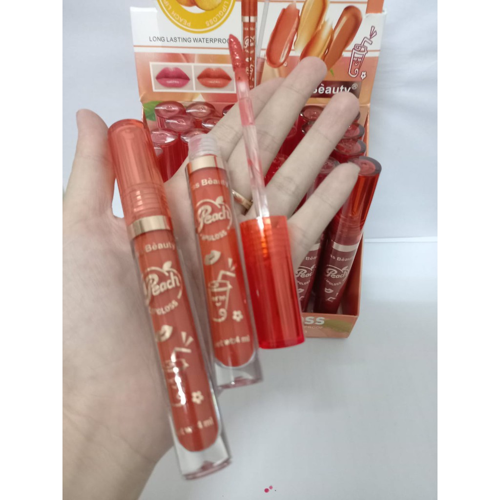 [PER 6 PCS] LIP GLOSS / LIPGLOSS KISS BEAUTY PEACH MATTE NO.70082-03