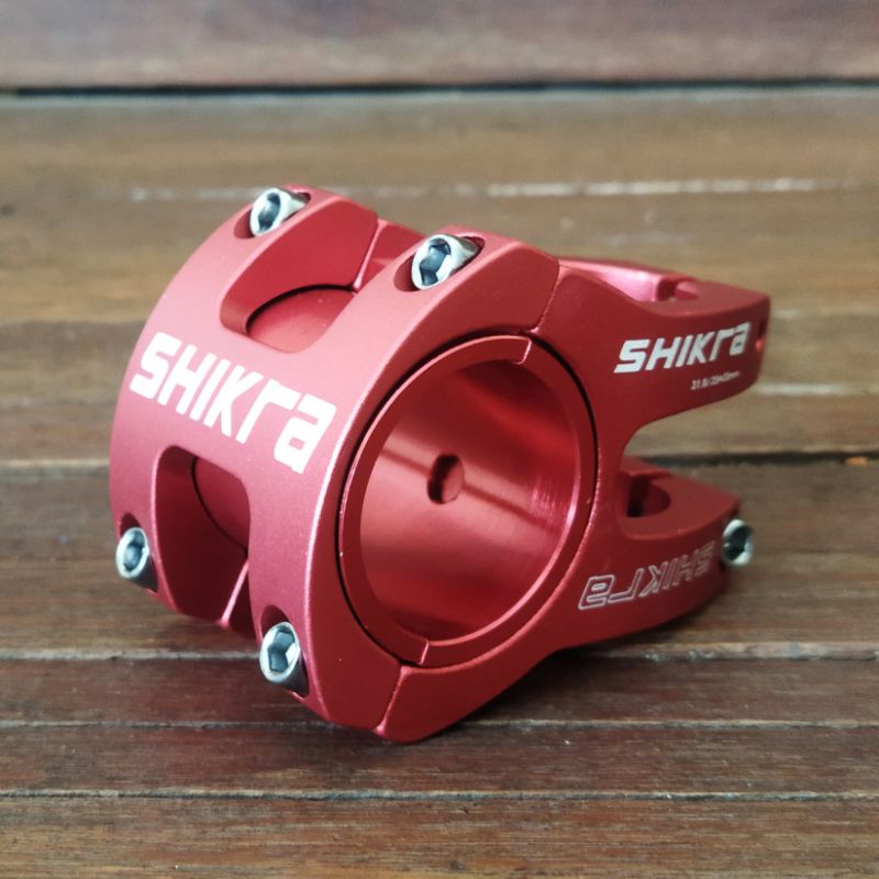 STEM MTB PENDEK SHIKRA 31.8 / 35 MERAH BKN STRUMMER