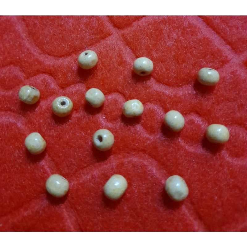 Mote Manik Kayu Bulat