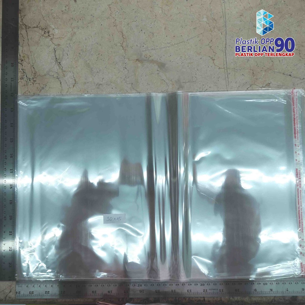 

35X42,5 CM PLASTIK OPP (SEAL/LEM) TEBAL 20 MIC ASLI / PLASTIK KEMASAN PAKAIAN / BAJU / CELANA