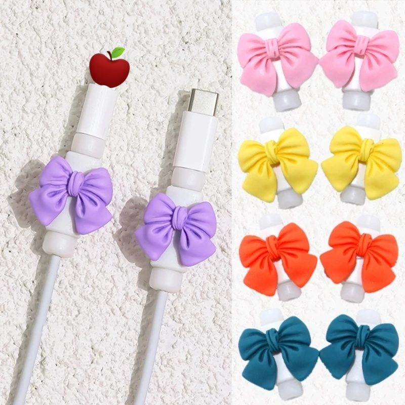 2pcs / Pak Pelindung Kabel Data / Charger USB Bentuk Dasi Kupu-Kupu Bahan Plastik Untuk iphone