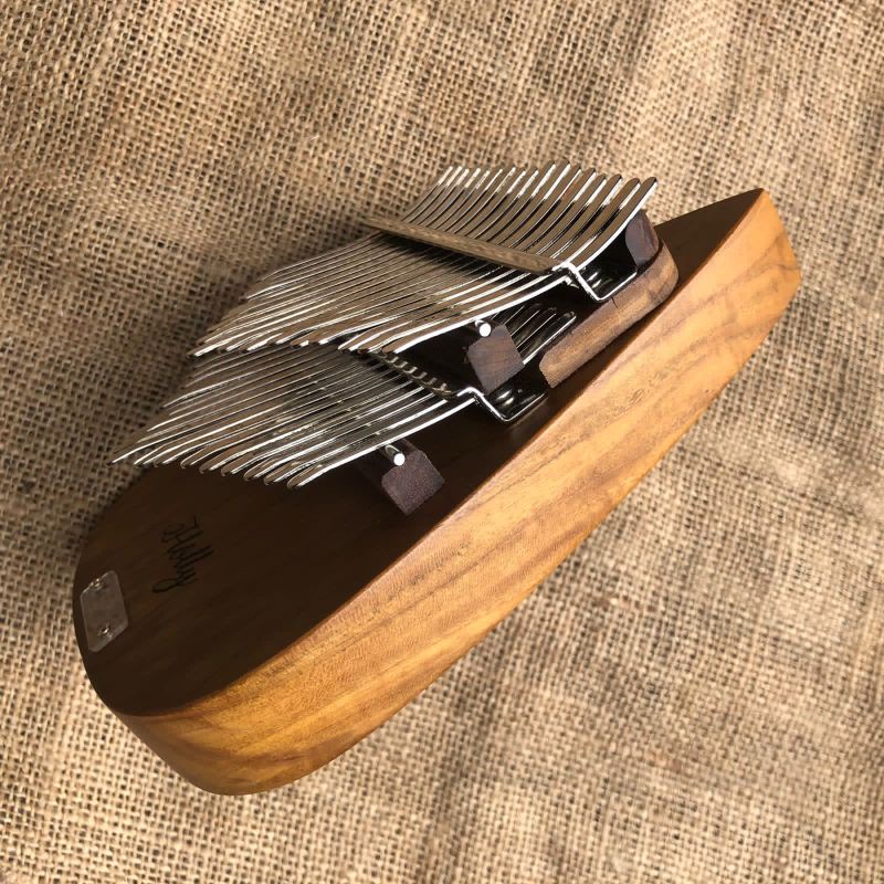 Kalimba Muria GhotamForm in the darkkalimba dounle layer 34keys