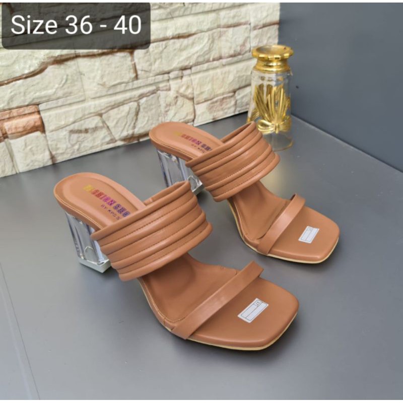 Sepatu hak tinggi kaca import