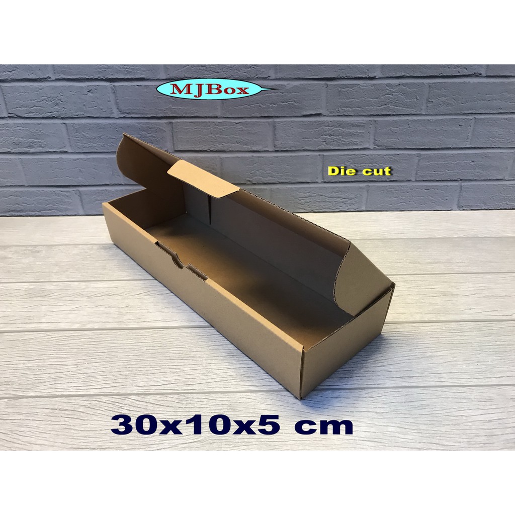 

Kardus 30 x 10 x 5 cm...Die Cut ( pembelian di atas 10 pcs harga lebih murah)