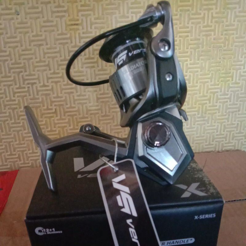 REEL SPINING VERSUS gladiator 1000 2000 3000 powerhandle
