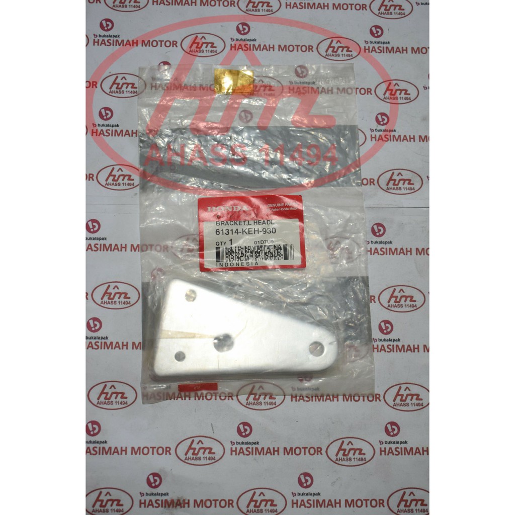 KUPINGAN BRACKET REFLEKTOR LAMPU DEPAN KIRI HONDA MEGAPRO - KODE PART: 61314KEH930