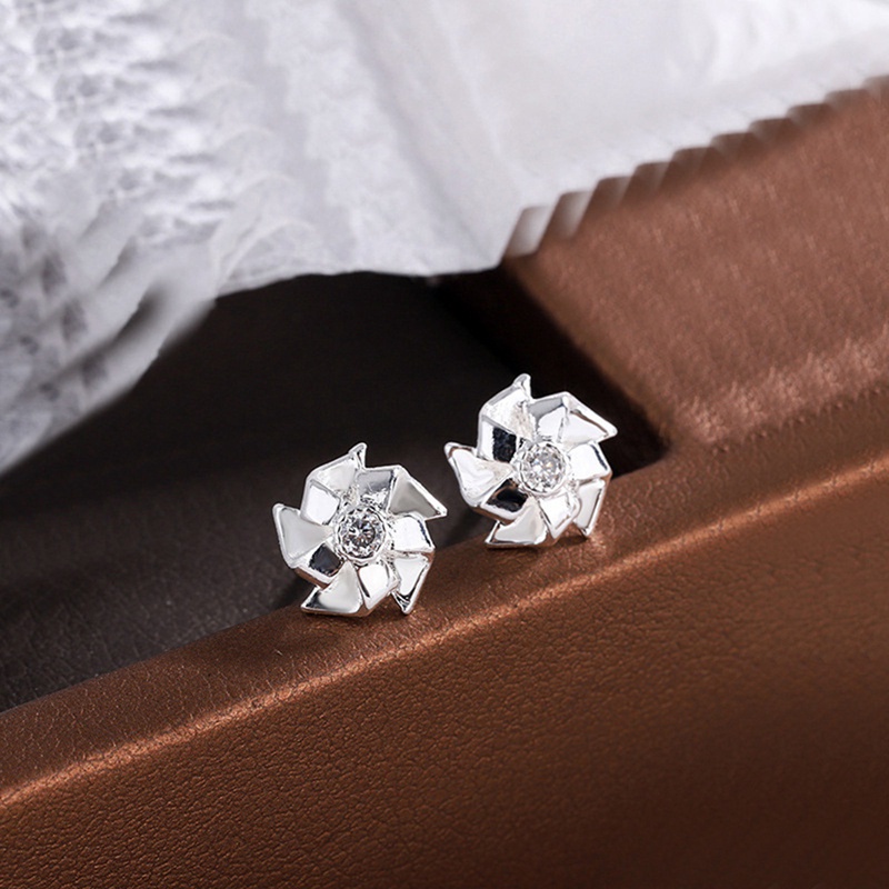 Fancyqube Anting Stud Desain Kincir Angin Keberuntungan Aksen Berlian Imitasi Warna Silver Untuk Wanita