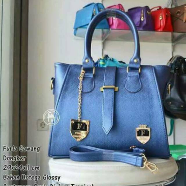 Tas glossy
