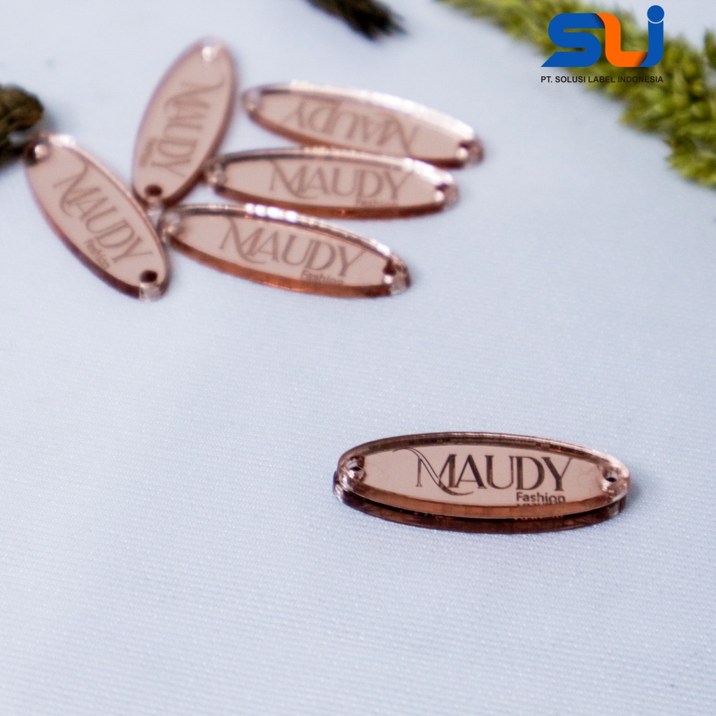 

label hijab | label baju | label akrilik | custom label | label jilbab | label cutting | label