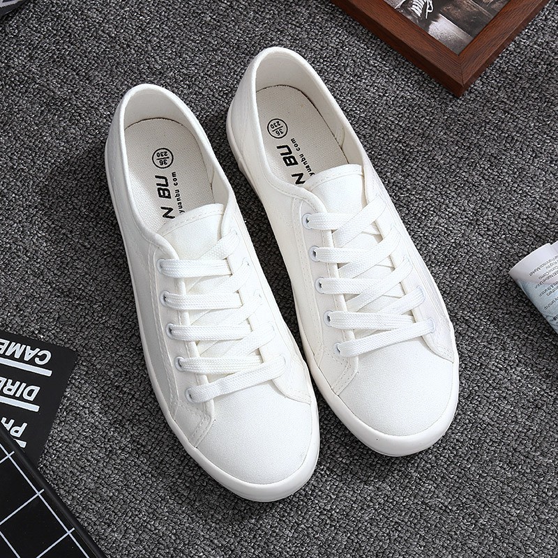 Sepatu Sneakers Wanita Bahan Kanvas Warna Putih Model Lace Sepatu Sneakers Wanita Bahan Kanvas Warna Putih Model Lace