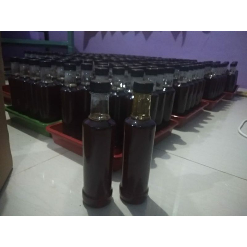 

madu hitam pahit propolis curah